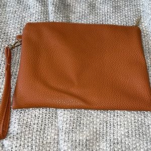 Burnt orange clutch